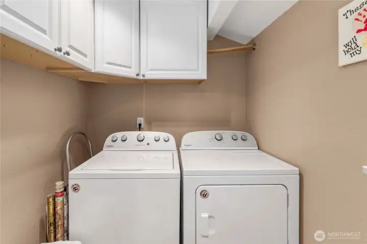 main floor laundry room - washer and dryer stay!