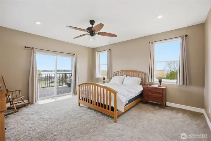 Primary bedroom with it's own deck entrance.
