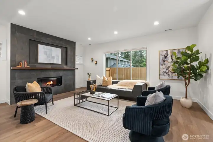 Floor ceiling tiled, gas fireplace with built-in TV nook, large enough for your flatscreen TV
