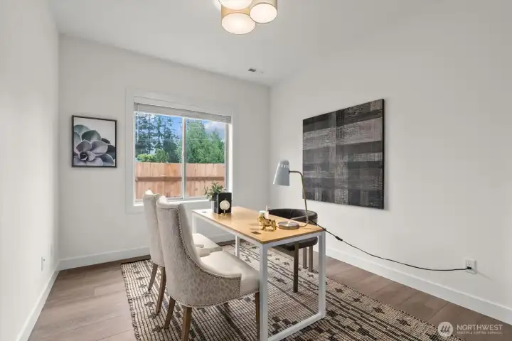 Main-level bedroom or office with adjacent 3/4 bath.