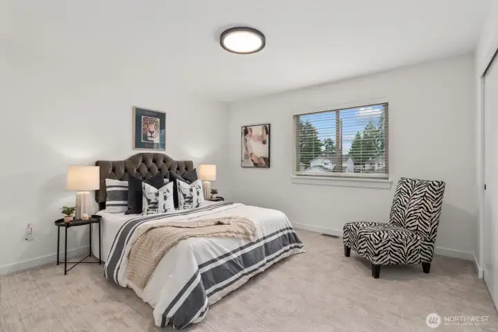 Fourth bedroom upstairs room for a queen size, bed and furniture.