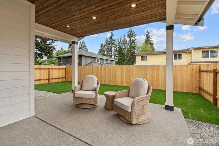 Covered patio designed for year-round enjoyment.