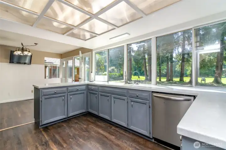 Spacious kitchen with ample counter space. Spacious kitchen with ample counter space.