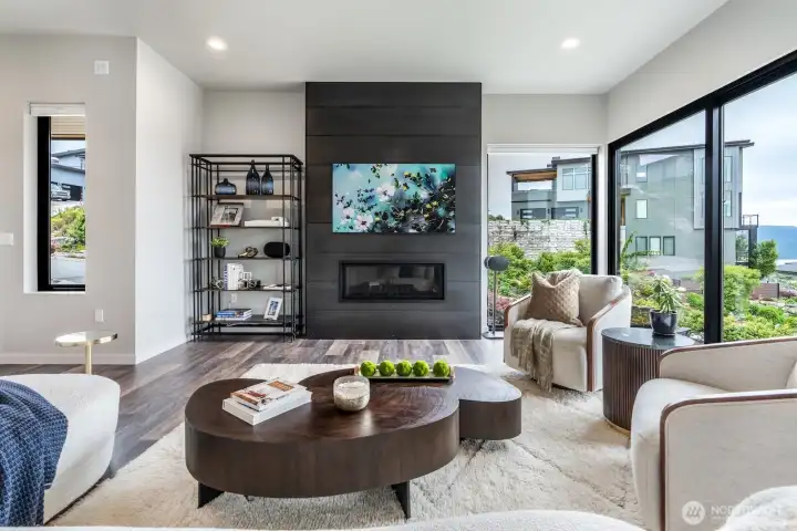 Samsung Art TV above gas fireplace.