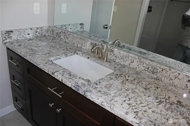 Undermount vanity sinks on the Granite countertops