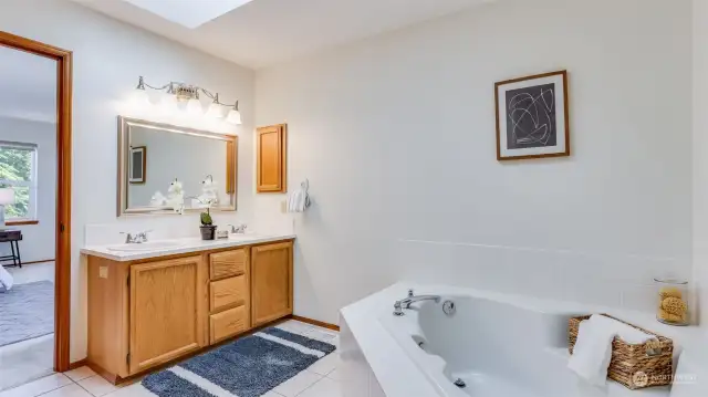 Enjoy the 5 piece en suite bath with double sinks and a large soaking tub, perfect after a long day! Plus new skylight installed in 2021!