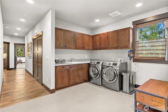 Large and functional utility/mudroom.