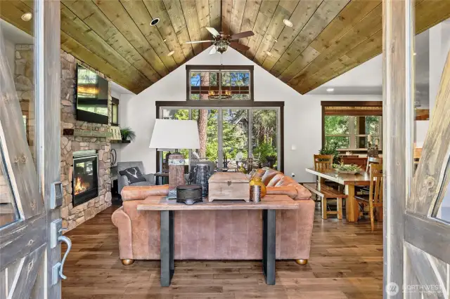 Warm great room with tongue-n-grove ceiling.