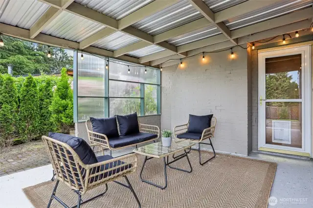 Quaint and cozy patio located out back.