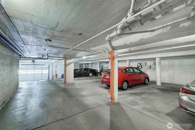Secure garage on bottom level with 18 spots, 12 outdoor, uncovered parking spots.