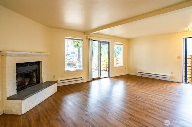 Unit 1 - laminate floors and wood-burning fireplace