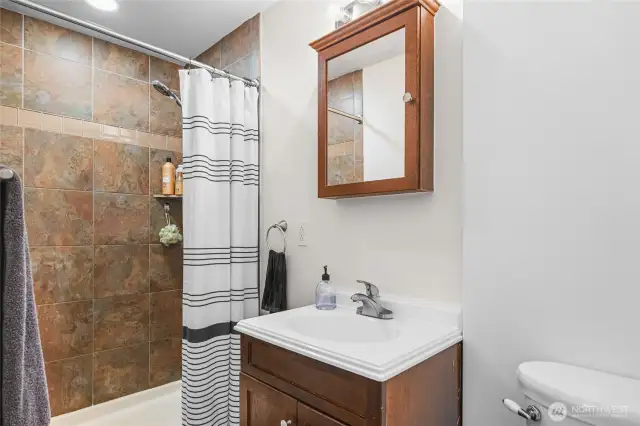 Primary 3/4 Bath with fresh paint and walk in shower for accessibility