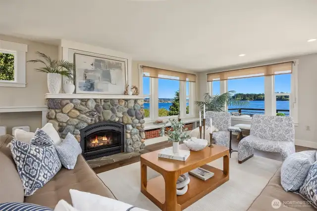 Gas fireplace with real stone surround.