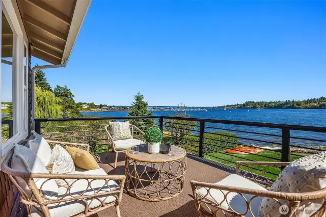 Massive waterside deck runs the length of the home!