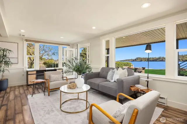 Family room with French door access to the HUGE beachside lawn and epic waterfront.