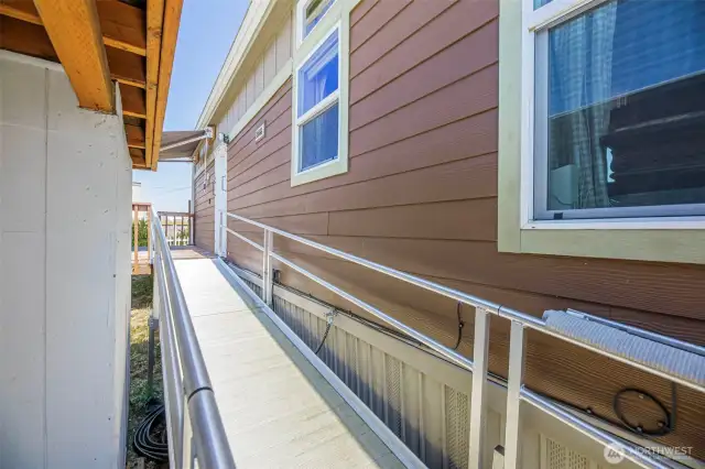 Need to avoid stairs? Here you have an alternative with a safe Ramp w/handrails to assist.