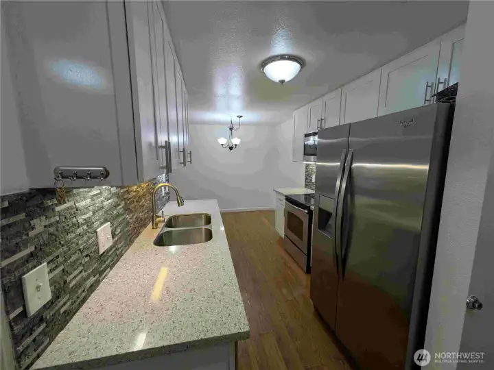 newer counters, backsplash & refridgerator