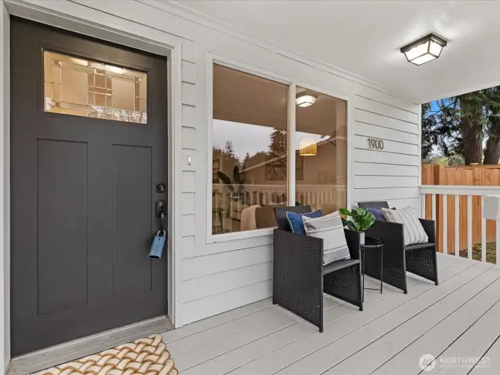 Covered front porch with plenty of space to relax and unwind