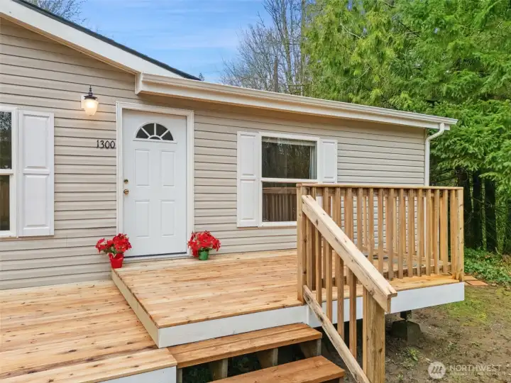 Deck is brand new. Foundation is built last. Stain to color and preserve the brand new deck top will come with the house for buyer to use when the weather turns dry again.