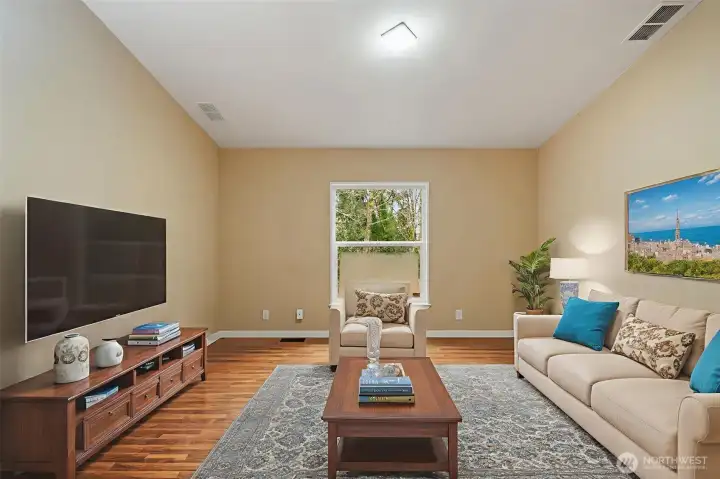 Photo contains virtual staging. Large flex room for media, family, rec, offices.