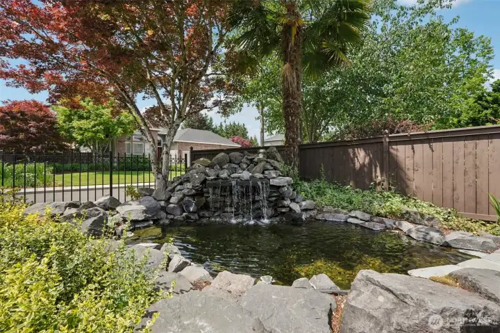 Waterfall feature with three tiered pond