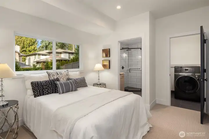 Bedroom 2 with ensuite 3/4 bath and full size 2 in 1 laundry!