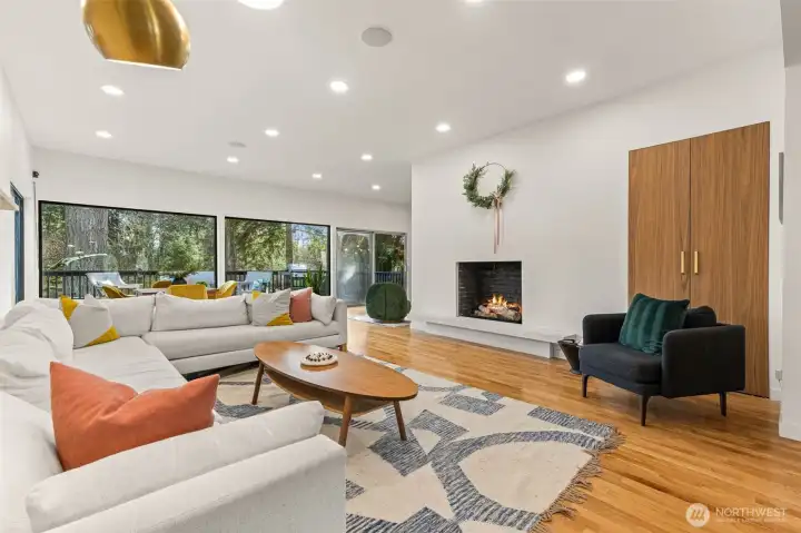 You are greeted with clean lines and natural light that pours through the massive windows. Fire place is plumbed for gas.