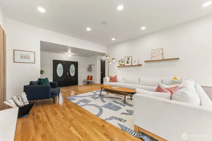New hardwood floors installed. Large double door entryway.