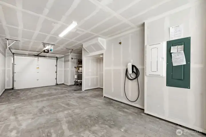 Tesla electric car charger included with every home.