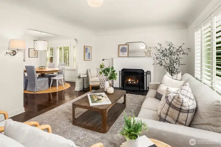 Generous living room with wood fireplace