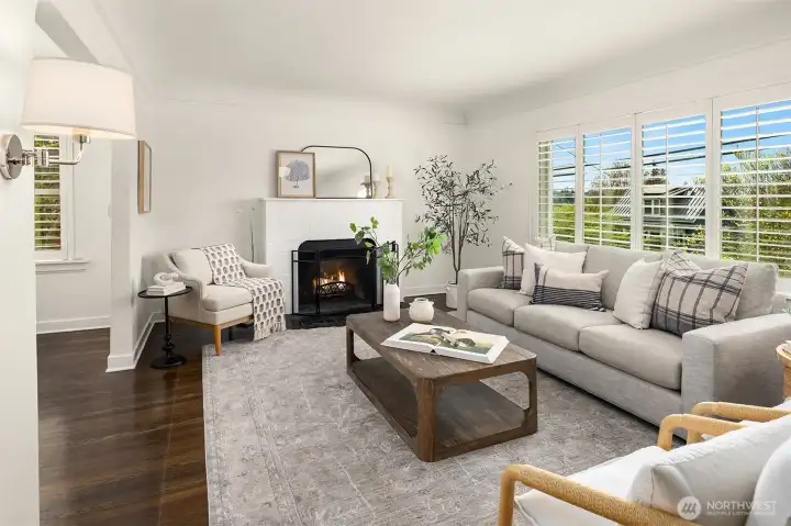Generous living room with wood fireplace