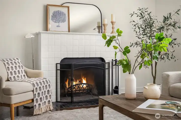 Generous living room with wood fireplace