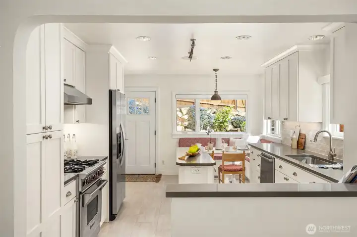 Updated kitchen with quartz counters, tons of thoughtful storage, and bright natural light