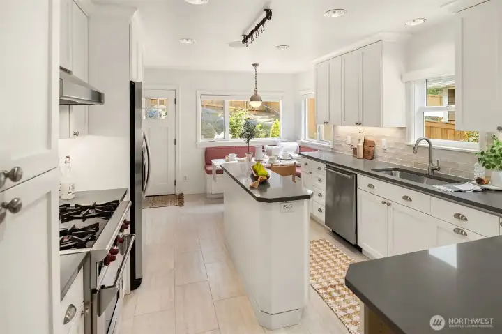 Updated kitchen with quartz counters, tons of thoughtful storage, and bright natural light