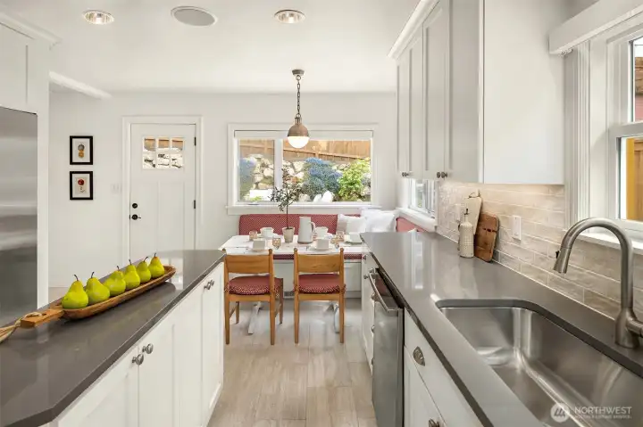 Updated kitchen with quartz counters, tons of thoughtful storage, and bright natural light