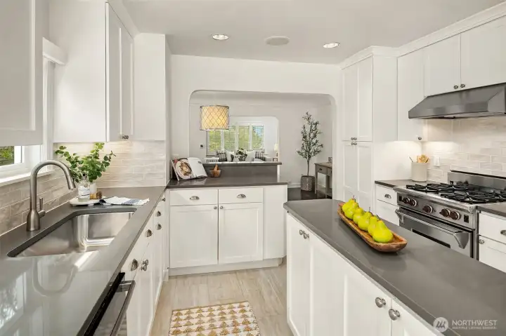 Updated kitchen with quartz counters, tons of thoughtful storage, and bright natural light