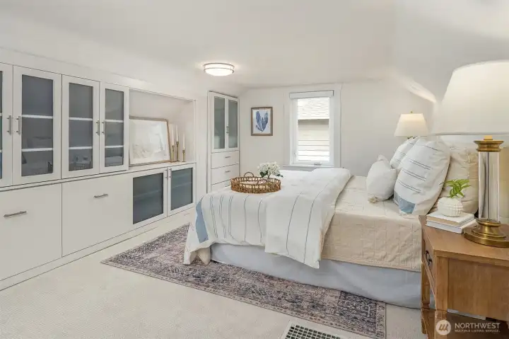 Top floor primary suite with large closets and lots of built in storage