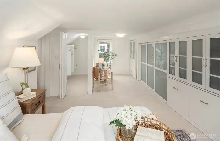 Top floor primary suite with large closets and lots of built in storage