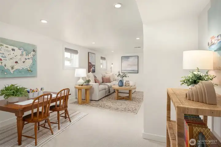 Lower level with bonus room, built in wall bed, sauna, and laundry room