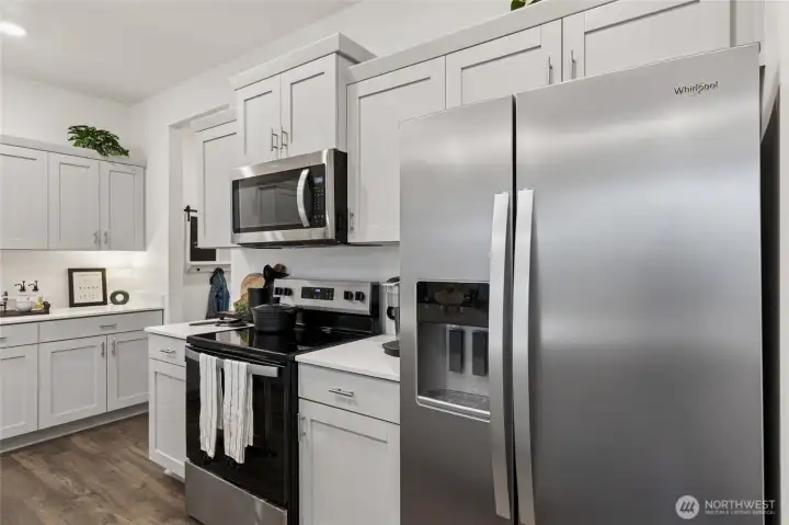 Stainless appliances. Fridge is optional. Photo is for representation only.