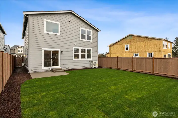 Average size backyard for our 4 bedroom homes. Bedroom 2. Photo is for representation only.