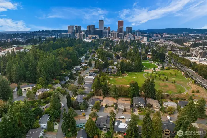 This stunning aerial view perfectly captures the home's unbeatable location in the Surrey Downs neighborhood, just blocks from the vibrant downtown Bellevue skyline, parks, world-class dining, and shopping.