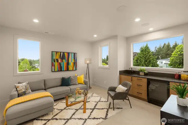 Upstairs media room with wet bar