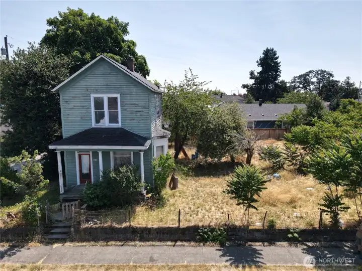 Another view of the home and large fenced yard. Another view of the home and large fenced yard.