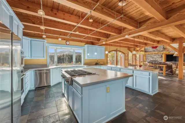 Stainless Steel appliances and counters, slate floors, exposed wood beams- perfect!