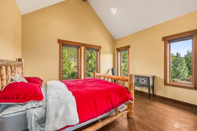 Guest Room with vaulted ceilings and lots of natural light!