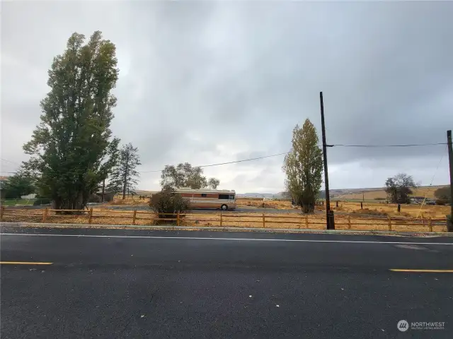 View of middle of property from First St looking West