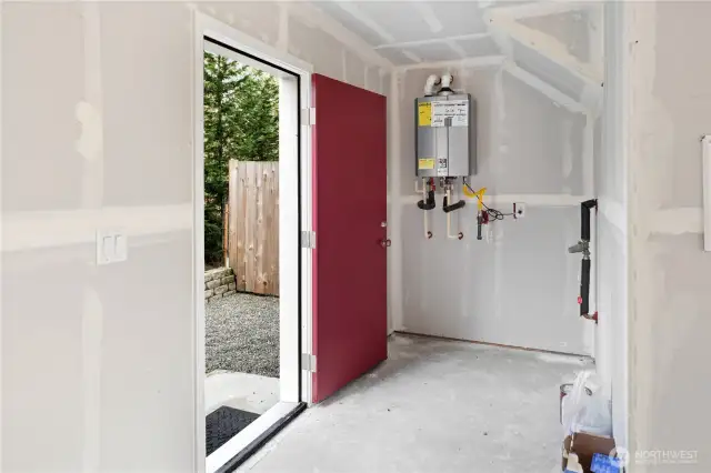 On demand hot water heater & door to backyard