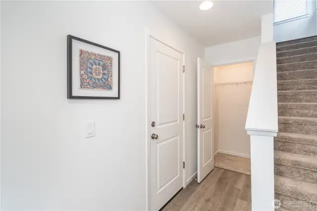 Entrance to garage and upstairs to main living