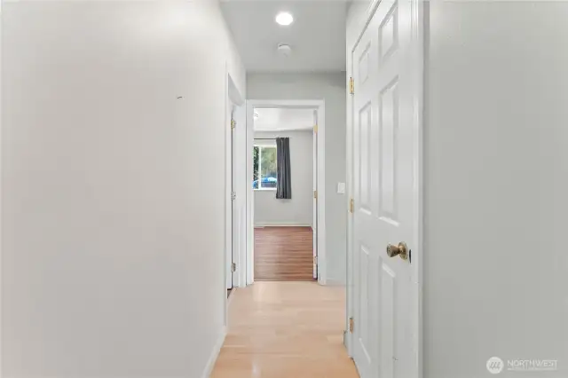 Laundry room on the left, half bath on the right